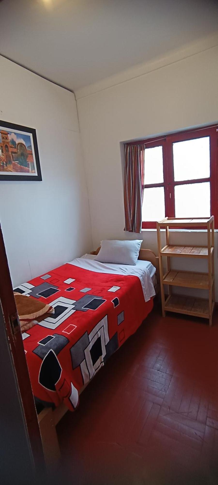 Sk Hostal Куско Стая снимка