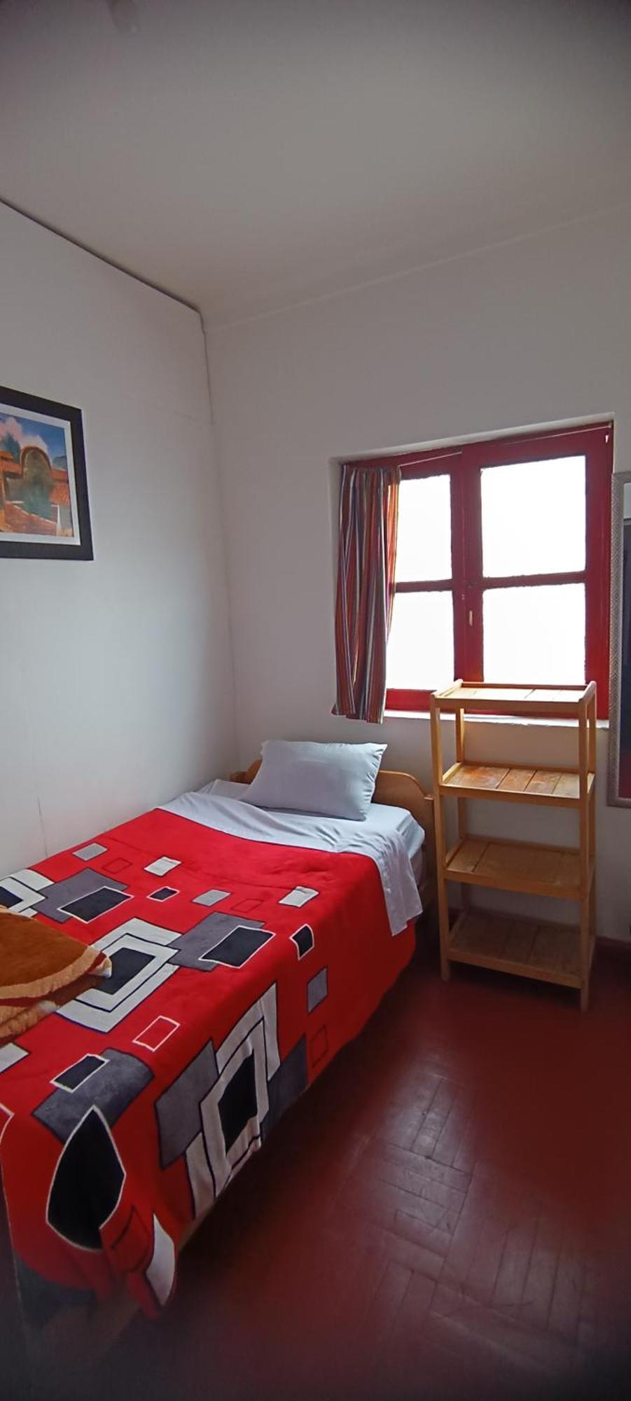 Sk Hostal Куско Стая снимка