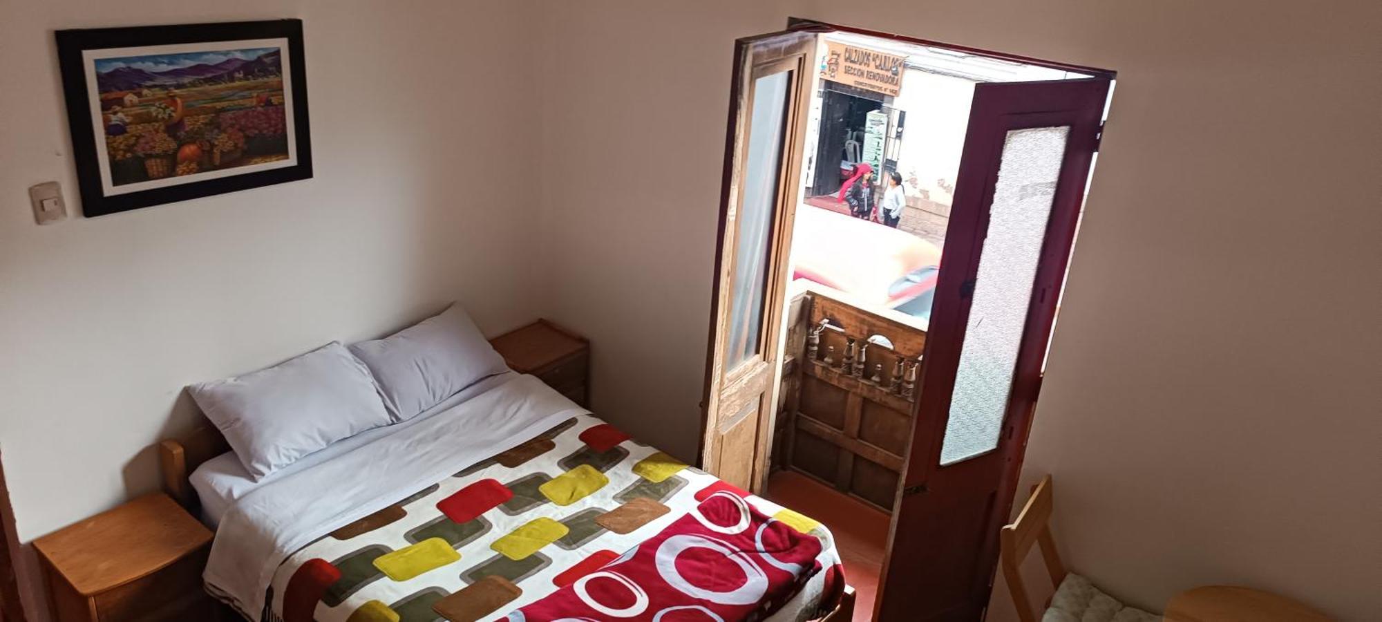Sk Hostal Куско Стая снимка