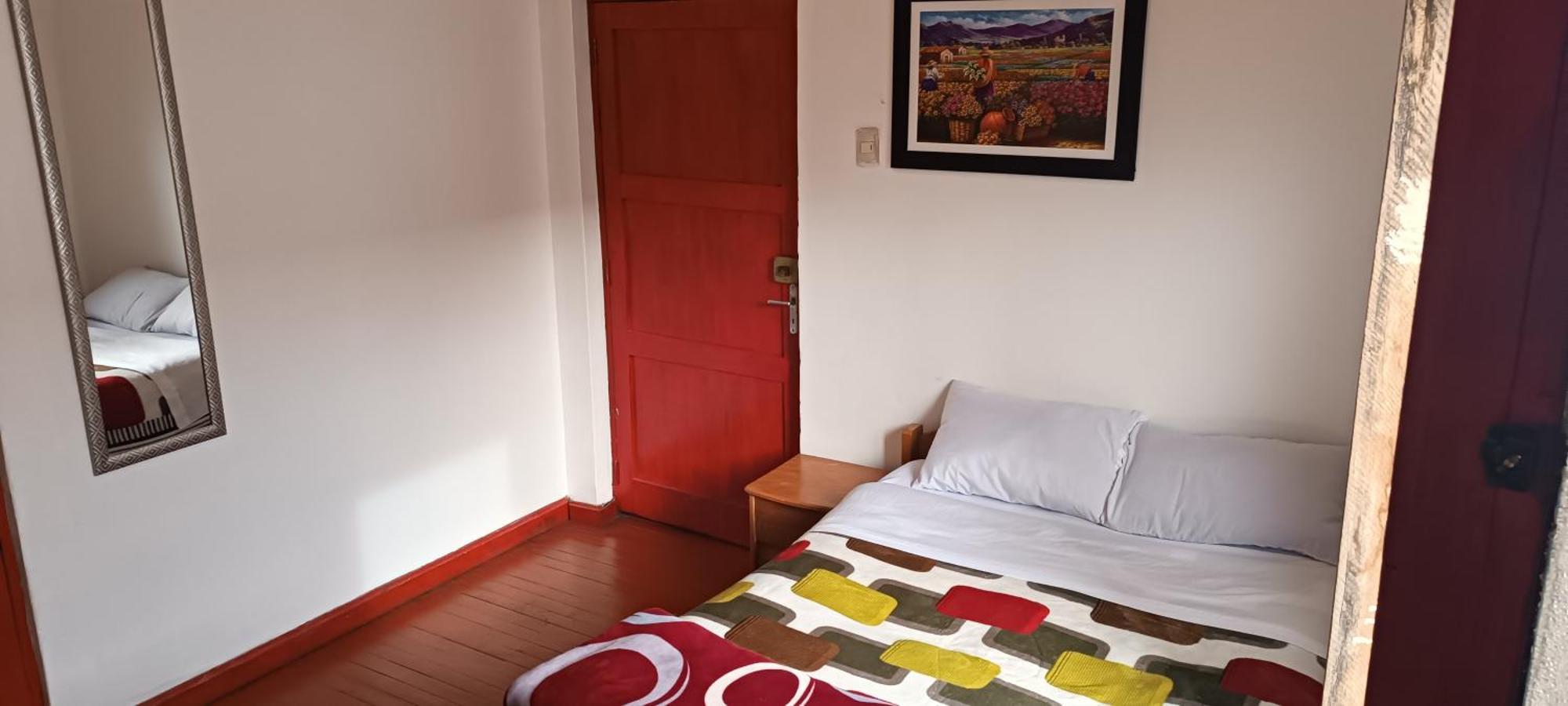 Sk Hostal Куско Стая снимка