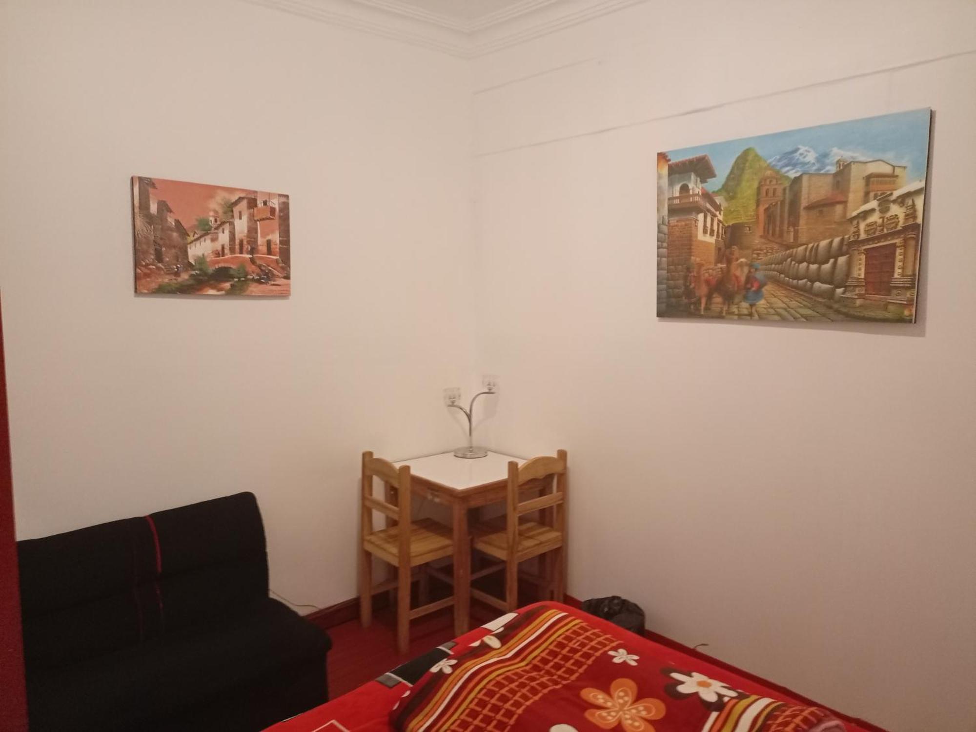 Sk Hostal Куско Стая снимка