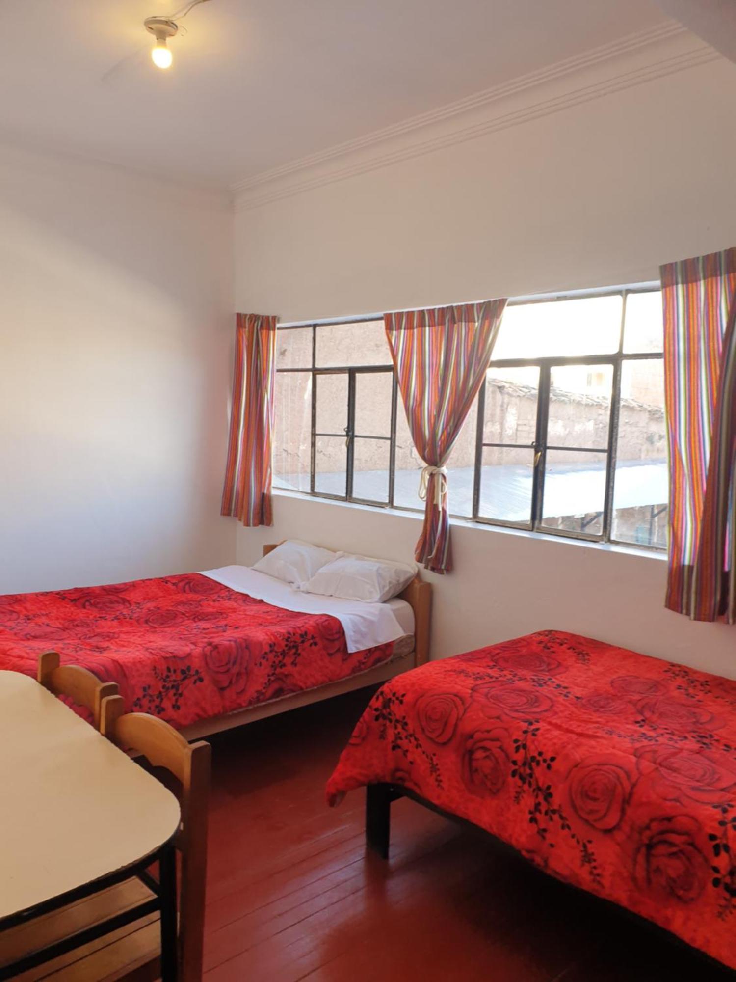 Sk Hostal Куско Стая снимка