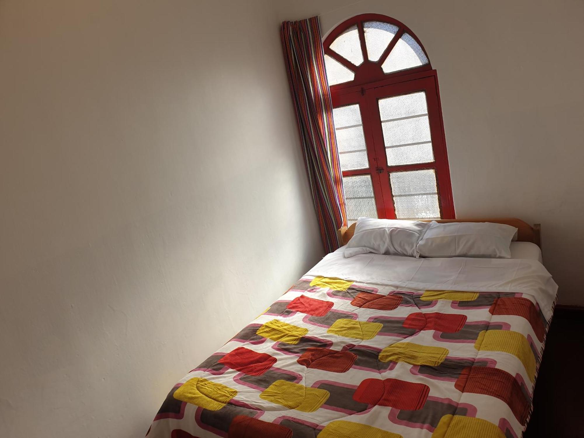 Sk Hostal Куско Стая снимка