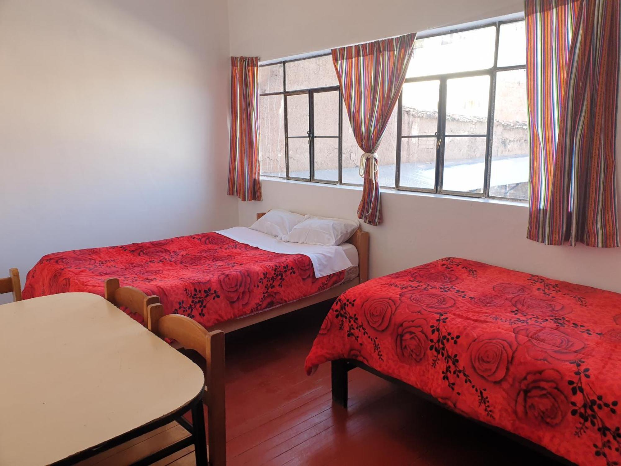 Sk Hostal Куско Стая снимка