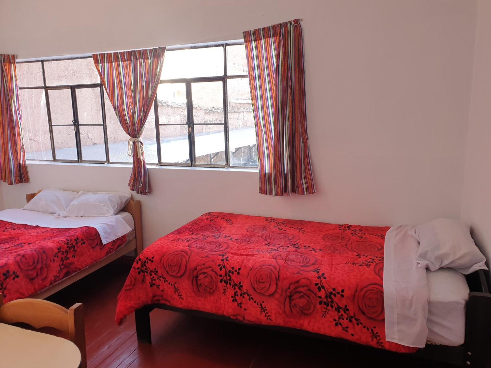 Sk Hostal Куско Стая снимка