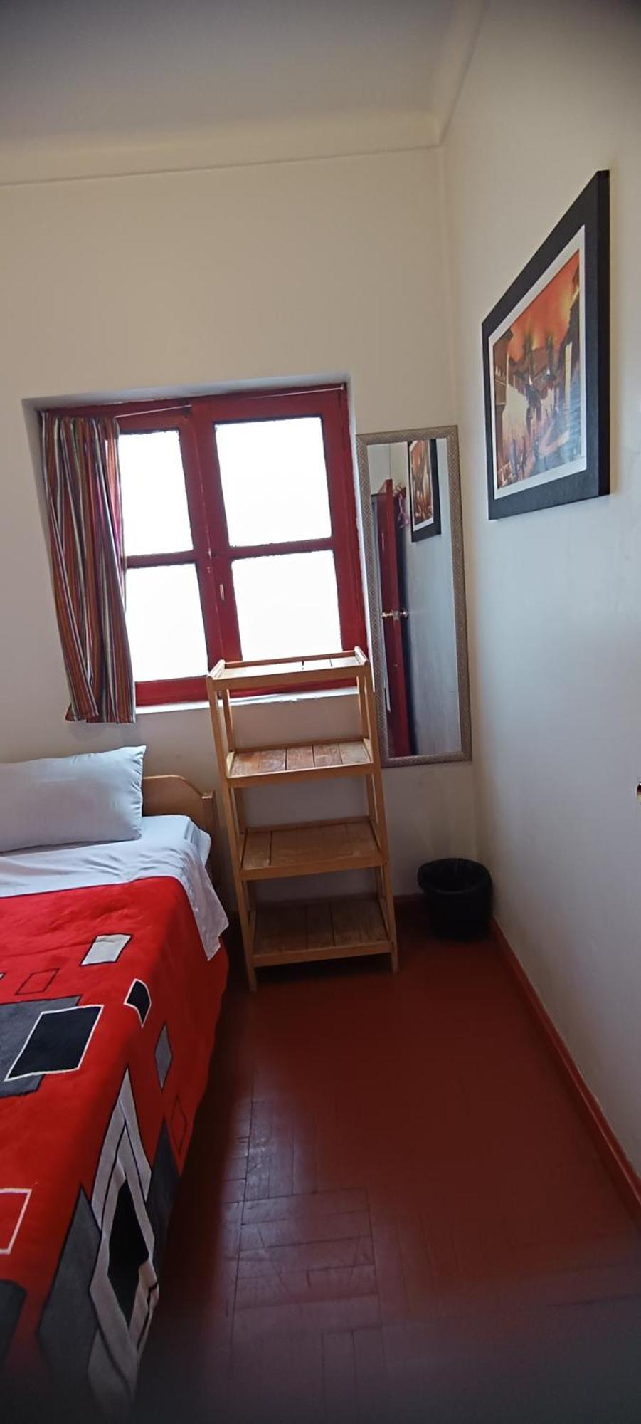 Sk Hostal Куско Стая снимка