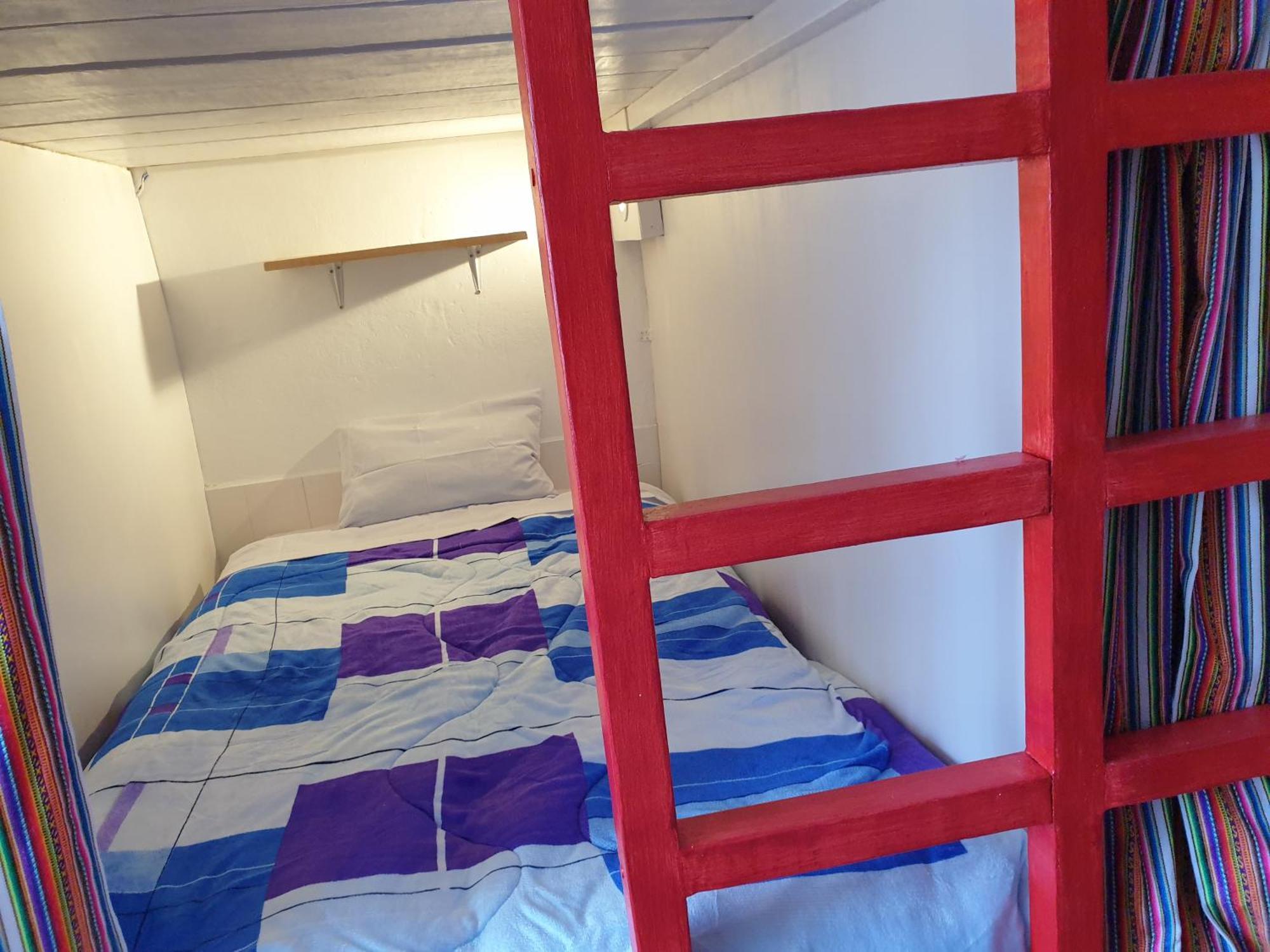 Sk Hostal Куско Стая снимка