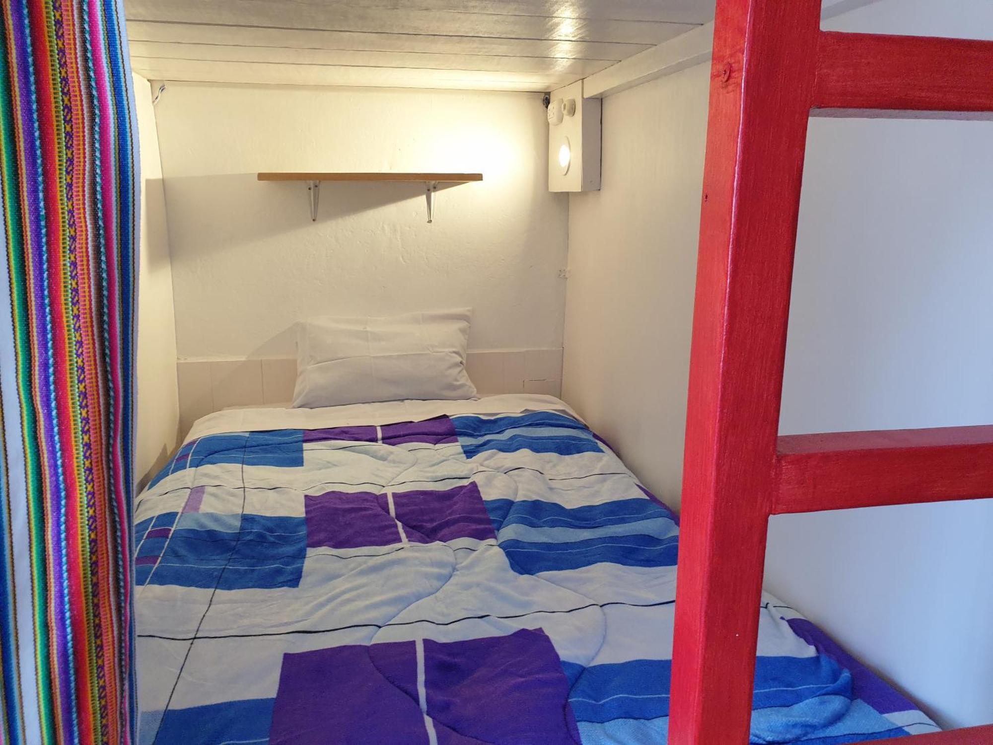 Sk Hostal Куско Стая снимка